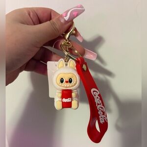 Coca-Cola Red Strap Keychain with White Character Holding Can
